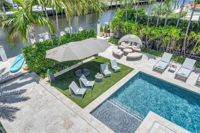 a view of living room filled with furniture and rug