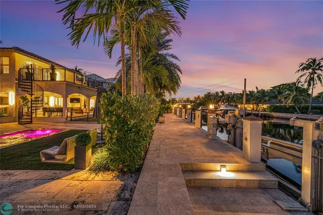 a view of a storage and utility room with washer and dryer