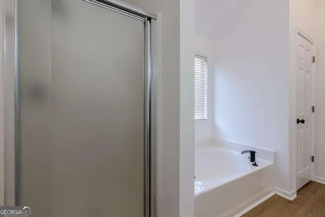 a bathroom with a bathtub