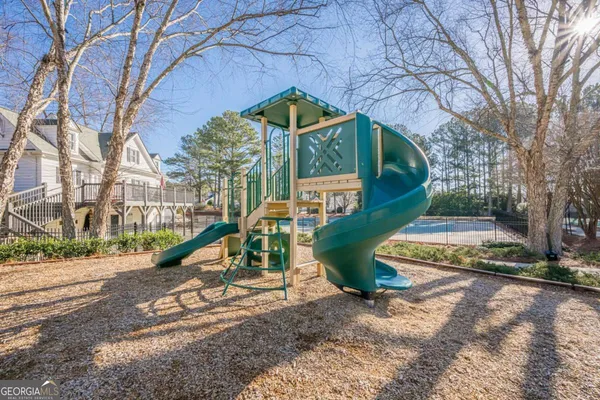 a view of a park with a slide