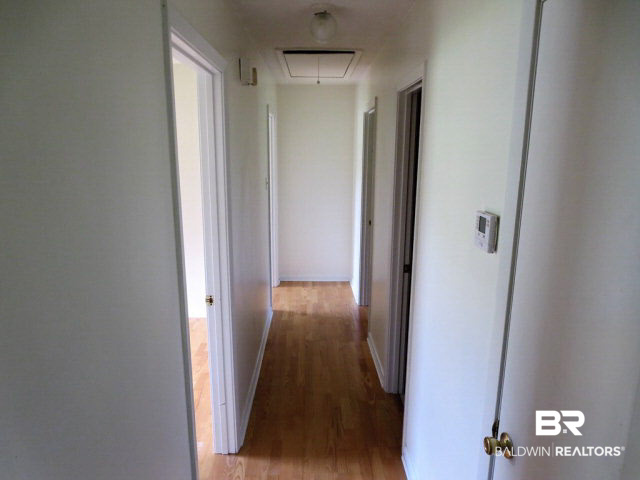 204 West Sycamore Avenue Foley, AL 36535 - Photo 6 of 11 Laminate floors throughout including halls