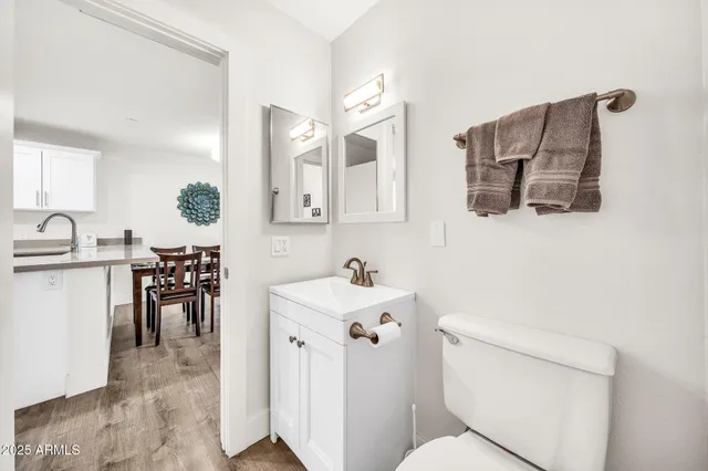 a kitchen with a stove and a refrigerator