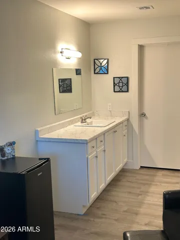 a view of a garden with a fountain in the patio