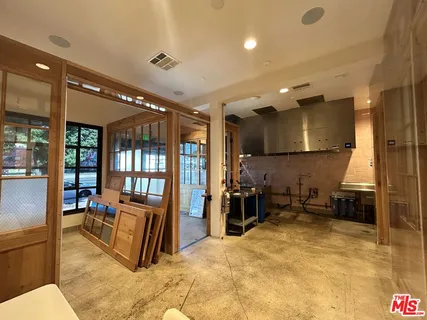 a kitchen with a sink and a stove