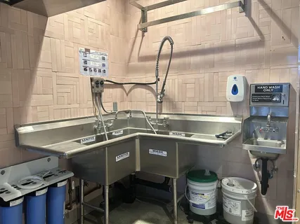 a view of a balcony with chairs