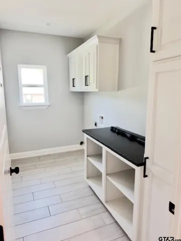 a bathroom with a tub and a shower