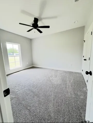 a bathroom with a toilet a sink and bathtub
