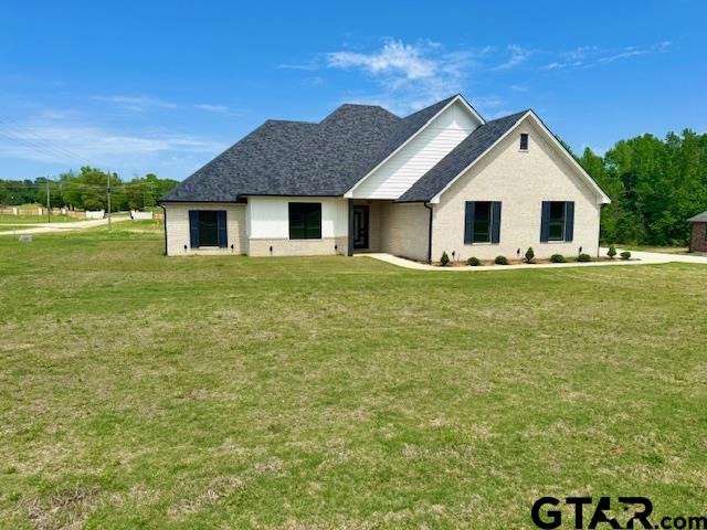 349 Brooks Jefferson, TX 75657 - Photo 2 of 23 a house view with a garden space
