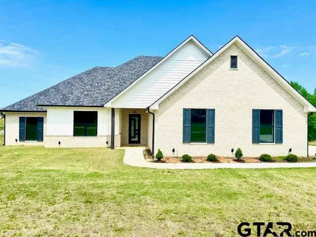 a front view of house with yard