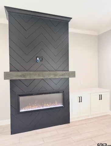 a living room with kitchen furniture and a kitchen view