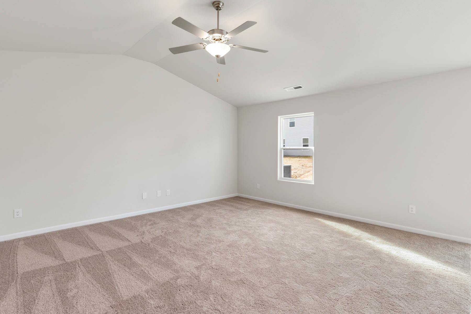 139 Crow Field Street Roxboro, NC 27574 - Photo 3 of 17 an empty room with a window and a fan