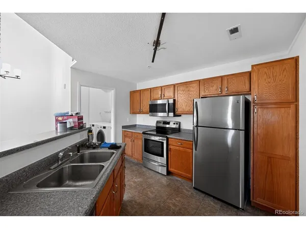 $325,000 | 5733 North Gibralter Way, Unit 306, Aurora, CO 80019