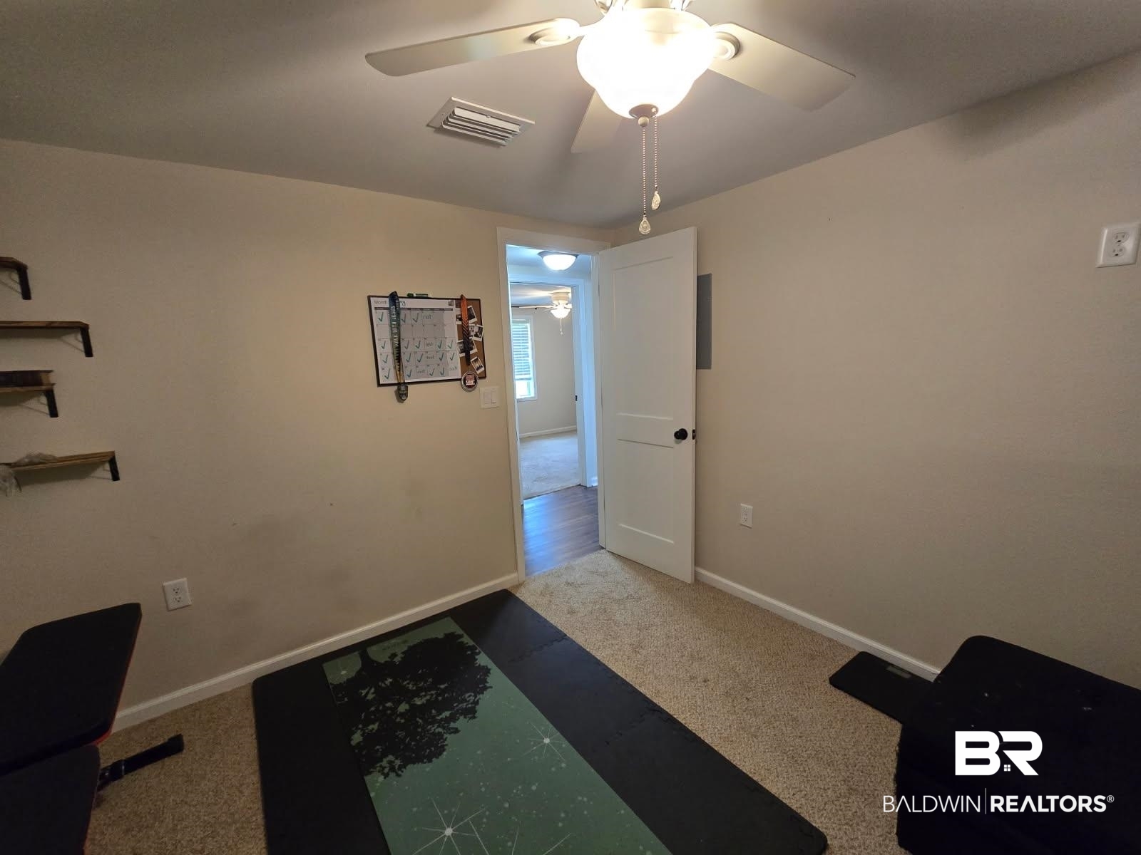 2534 Foshee Road Brewton, AL 36426 - Photo 4 of 16 Carpeted home office featuring ceiling fan, baseboards, and visible vents