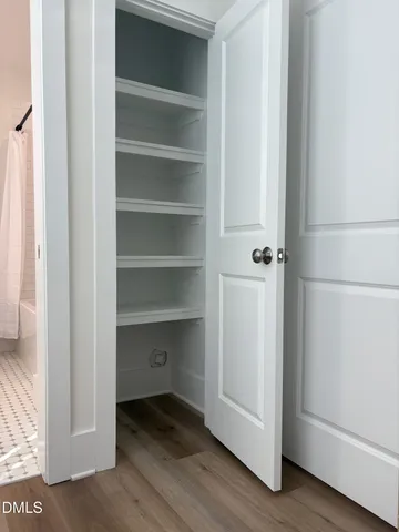 a view of an empty walk in closet