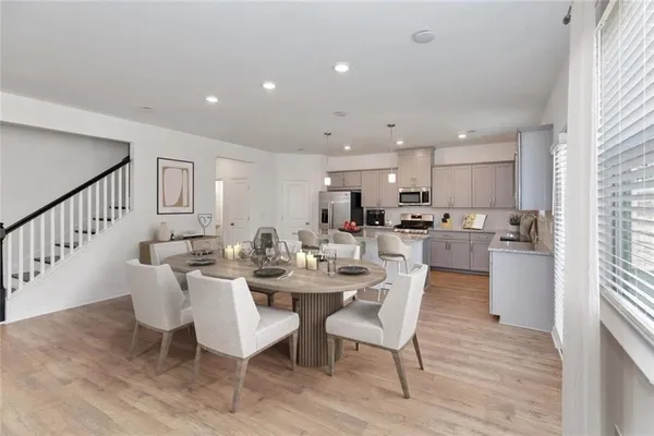 a view of a dining room with furniture