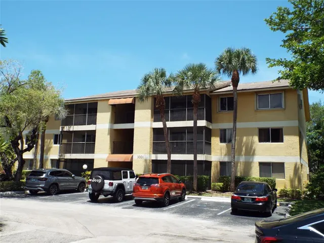 a cars parked in front of a building