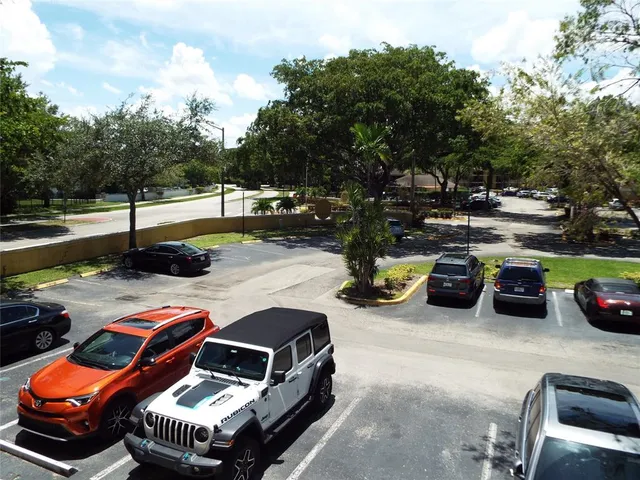 a outdoor space with patio lots of furniture and iron fence