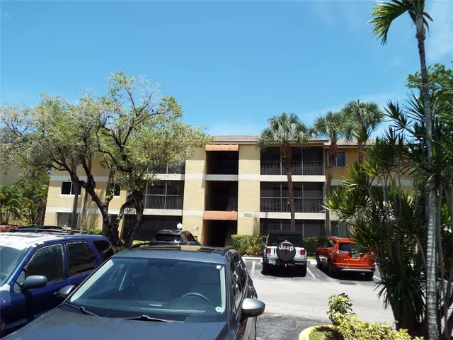 a car parked in front of a house