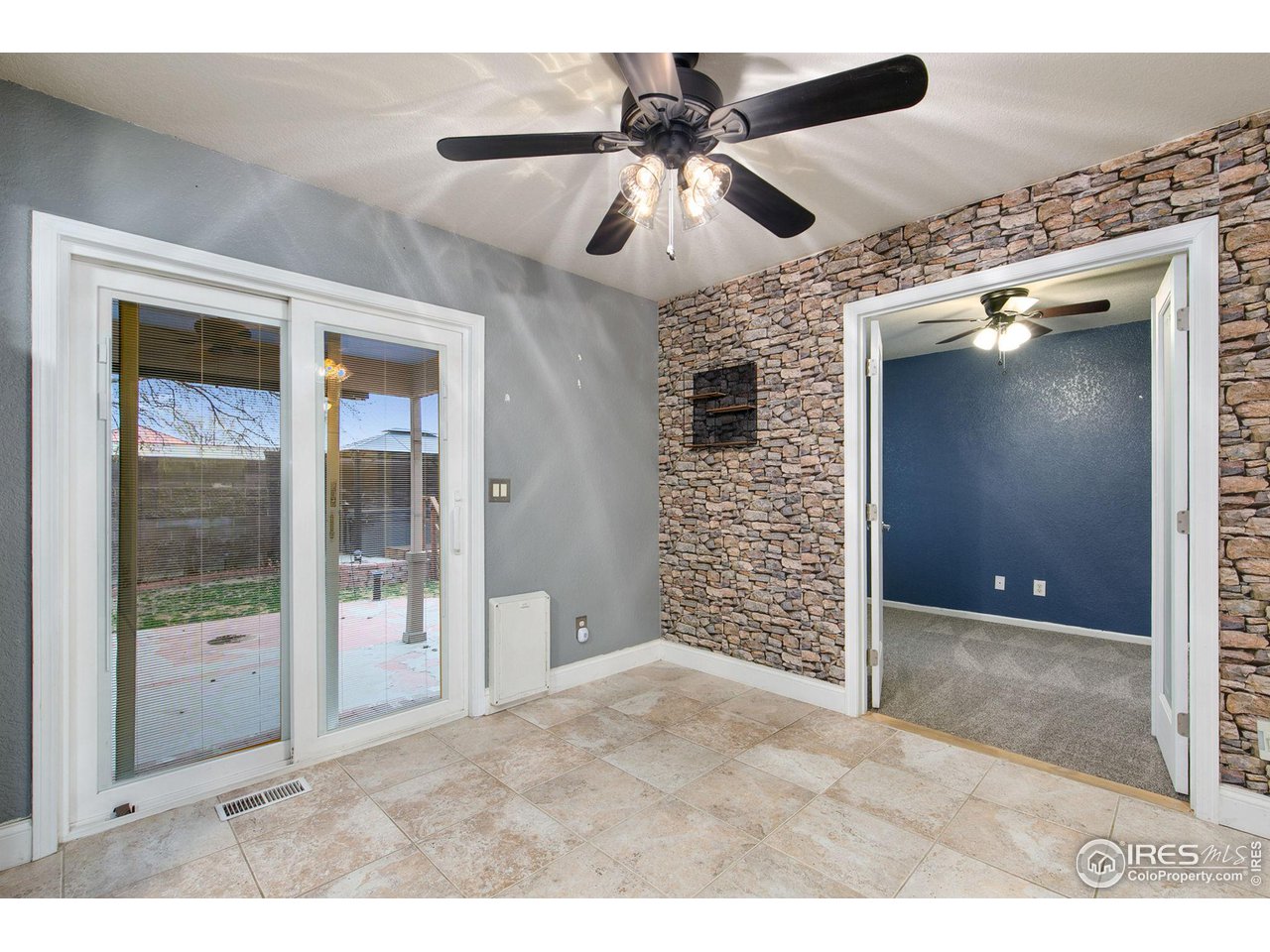 3217 Baldwin Avenue Evans, CO 80620 - Photo 12 of 28 a view of an empty room and window