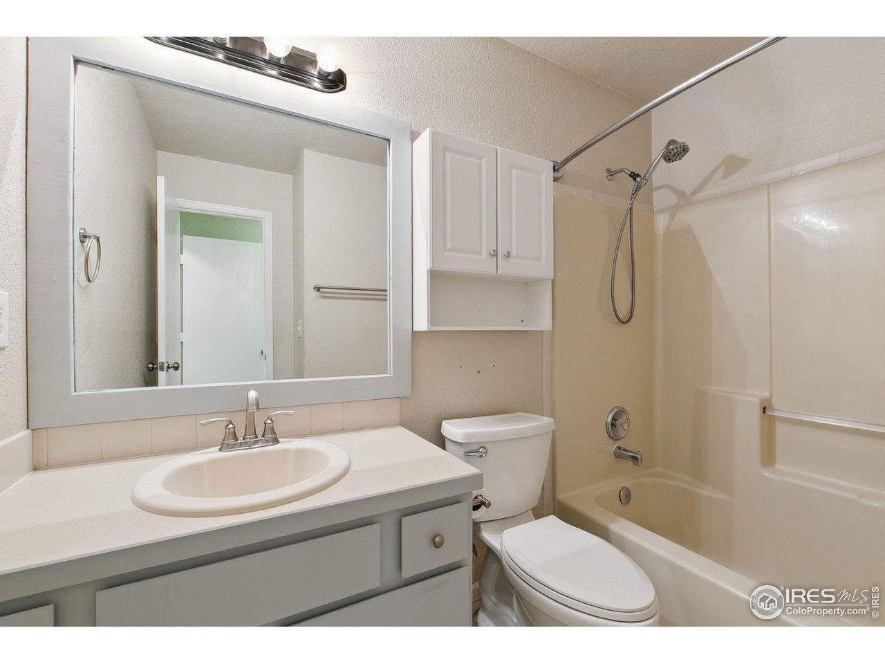 3217 Baldwin Avenue Evans, CO 80620 - Photo 15 of 28 a bathroom with a sink toilet tub and shower