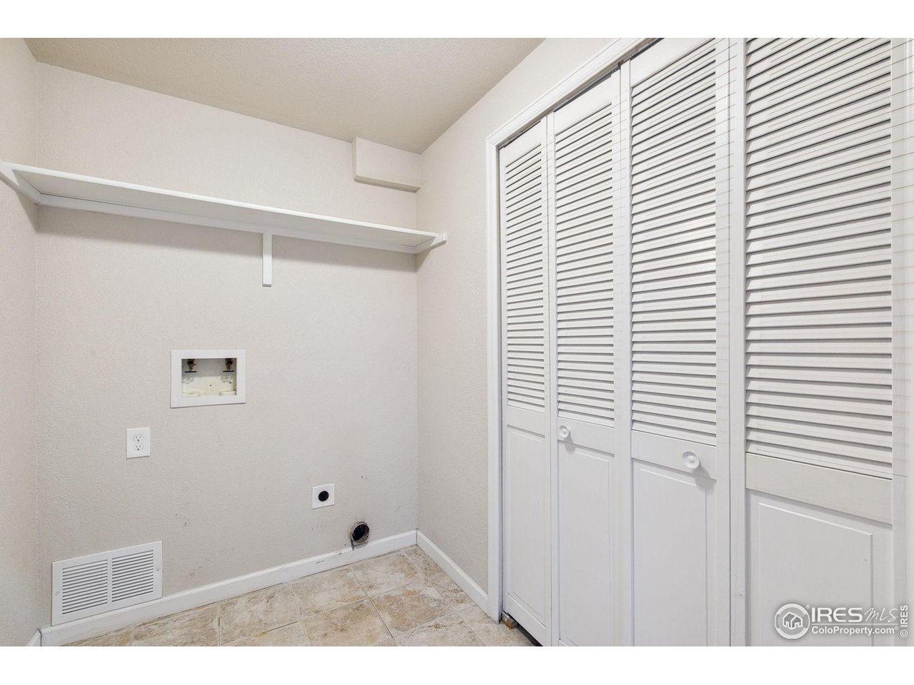 3217 Baldwin Avenue Evans, CO 80620 - Photo 18 of 28 a view of a closet