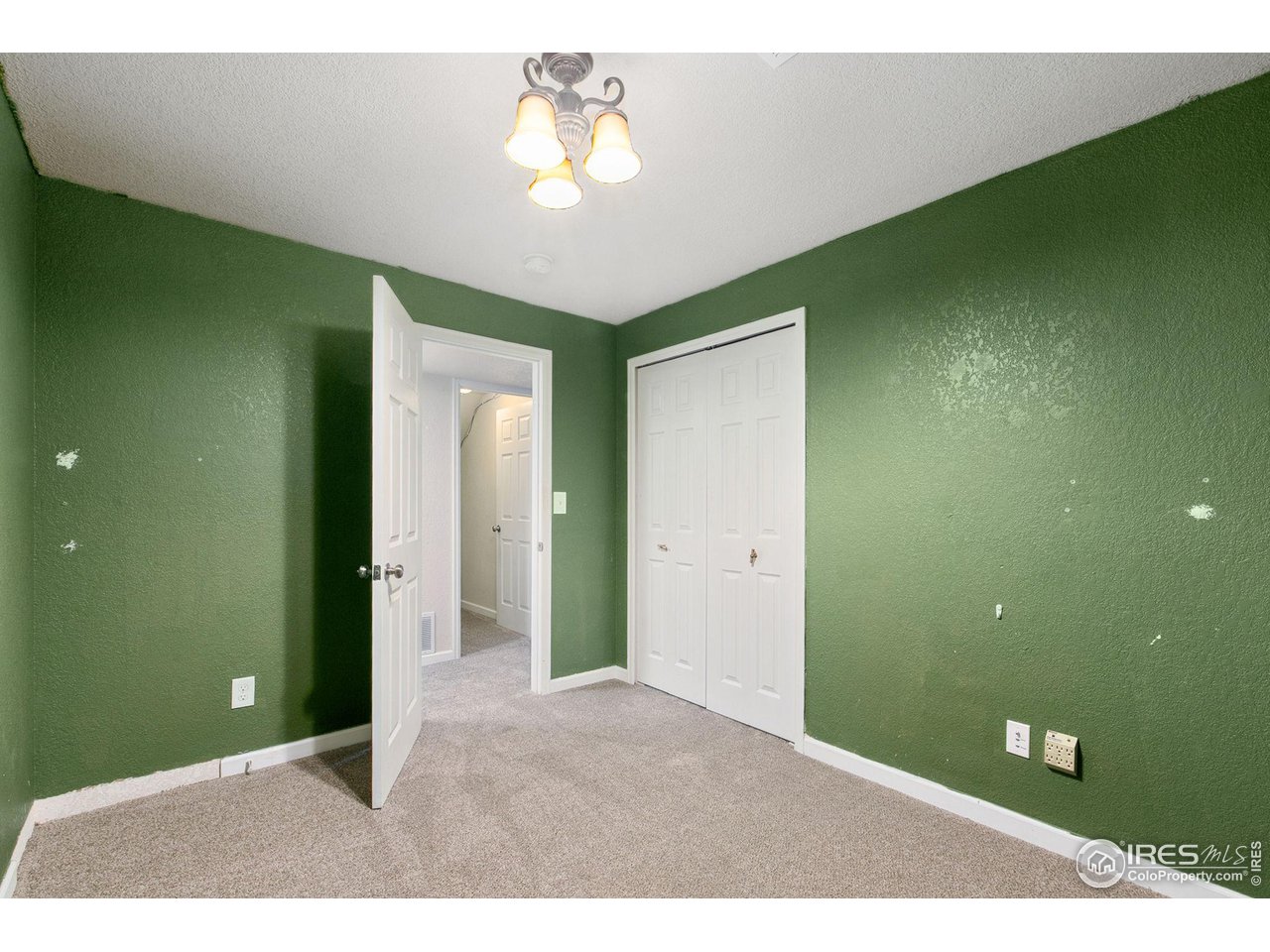 3217 Baldwin Avenue Evans, CO 80620 - Photo 22 of 28 a view of livingroom with kitchen