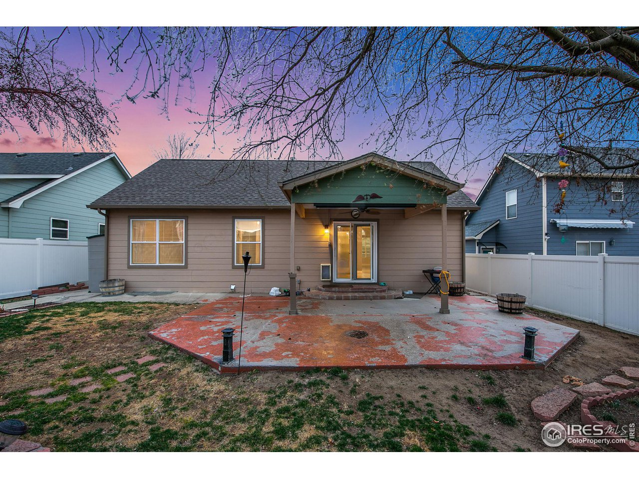 3217 Baldwin Avenue Evans, CO 80620 - Photo 28 of 28 a view of a house with backyard and sitting area