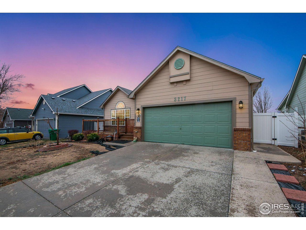 3217 Baldwin Avenue Evans, CO 80620 - Photo 3 of 28 a view of a house with a yard