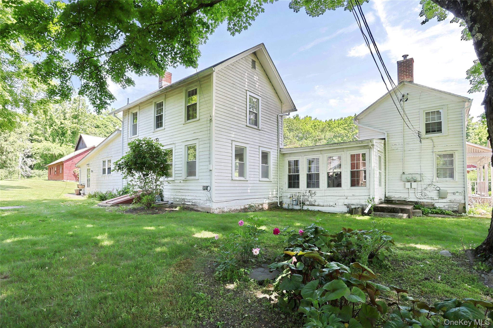 500 Haverstraw Road Suffern, NY 10901 - Photo 23 of 36 front view of a house with a yard