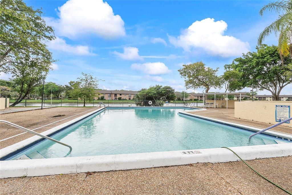 3955 North Nob Hill Road, Unit 404 Sunrise, FL 33351 - Photo 14 of 14 a view of lake