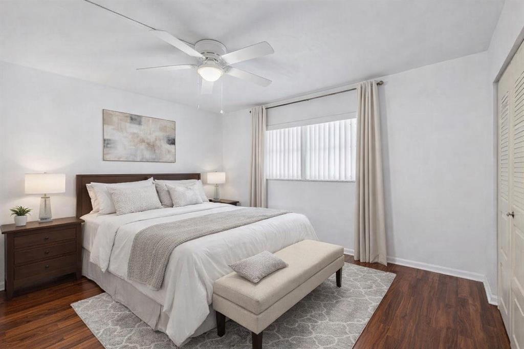 3955 North Nob Hill Road, Unit 404 Sunrise, FL 33351 - Photo 7 of 14 a bedroom with a bed and a window