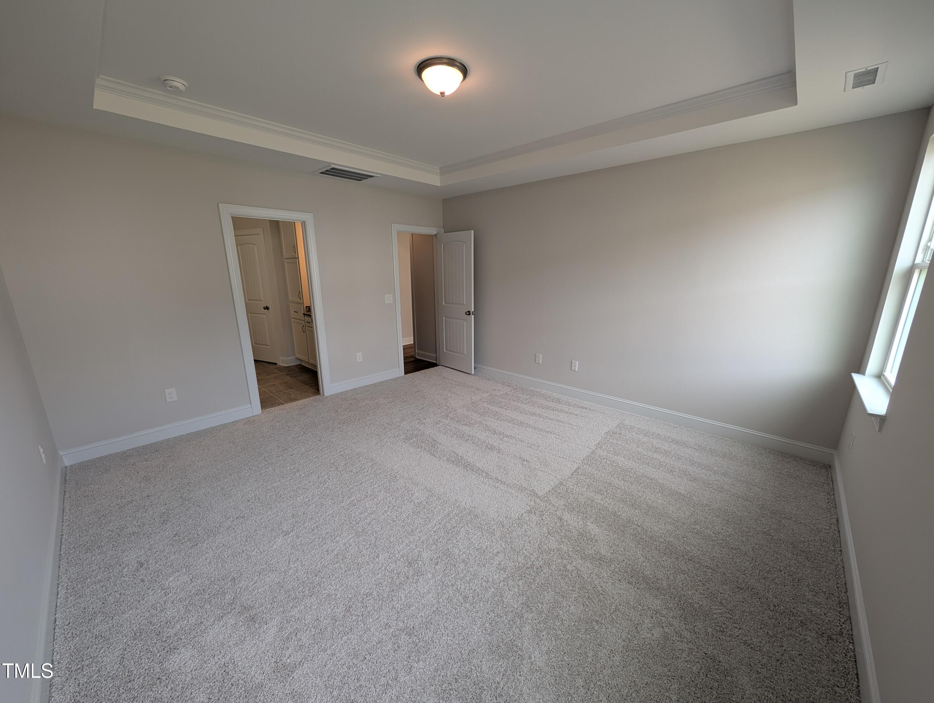 46 Steppe Way Garner, NC 27529 - Photo 14 of 31 a view of an empty room and window