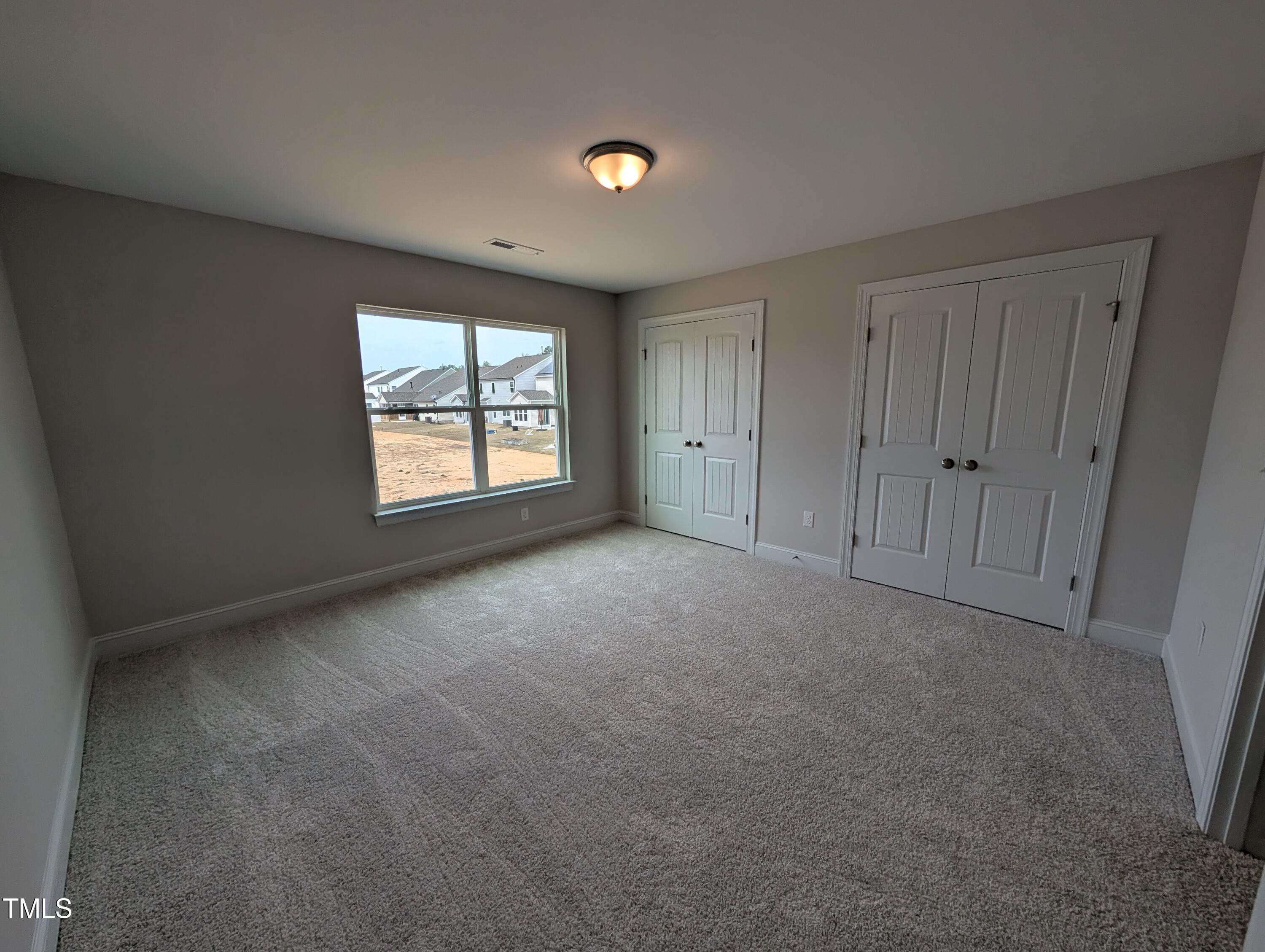 46 Steppe Way Garner, NC 27529 - Photo 22 of 31 a view of empty room with window