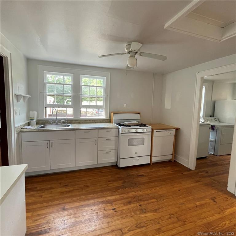 92 Compo Road South Westport, CT 06880 - Photo 10 of 19 New kitchen cabinetry. Newer appliances. Separate laundry room/storage.