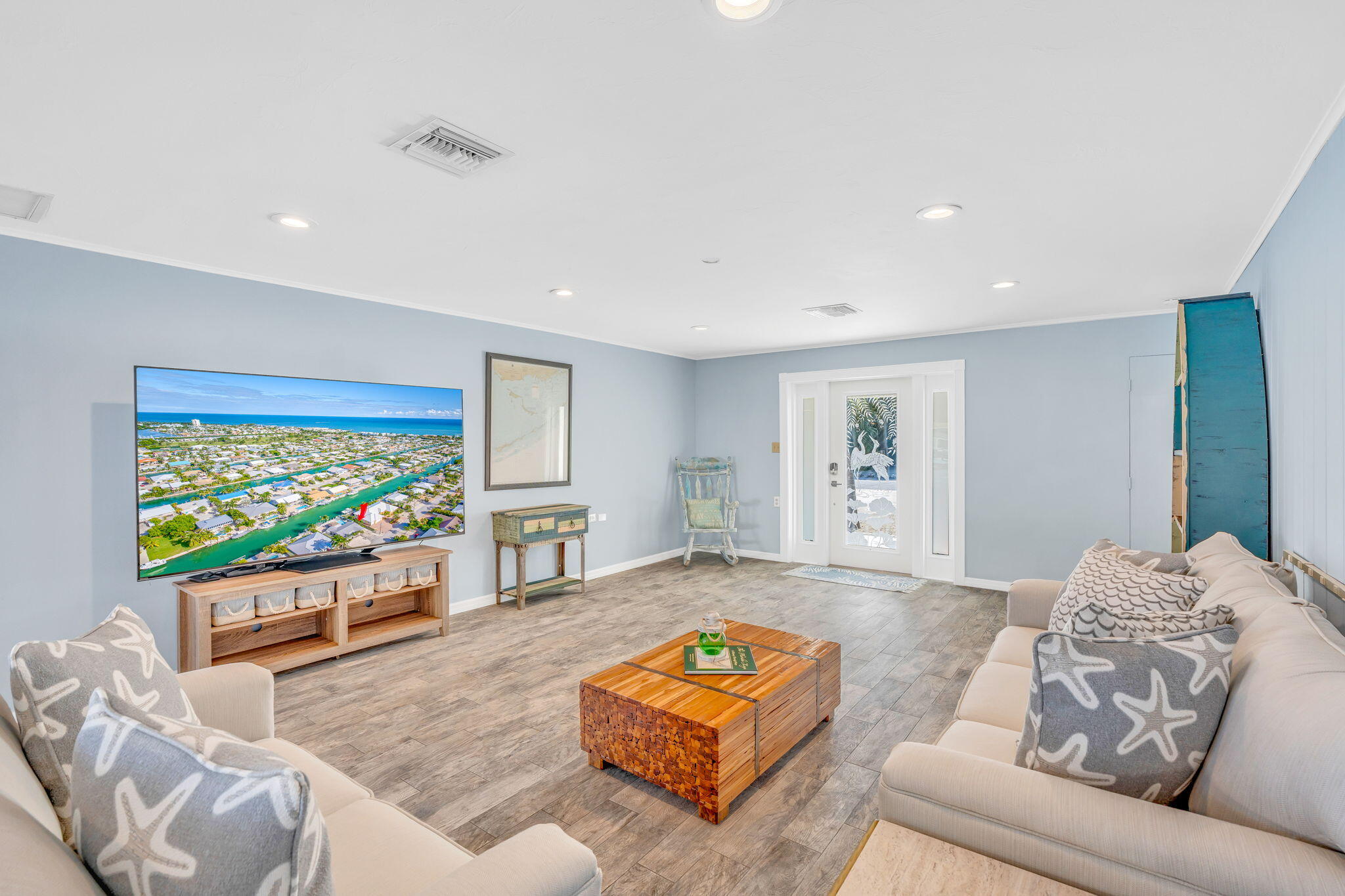 600 12th Street Key Colony Beach, FL 33051 - Photo 20 of 40 a living room with furniture and a flat screen tv