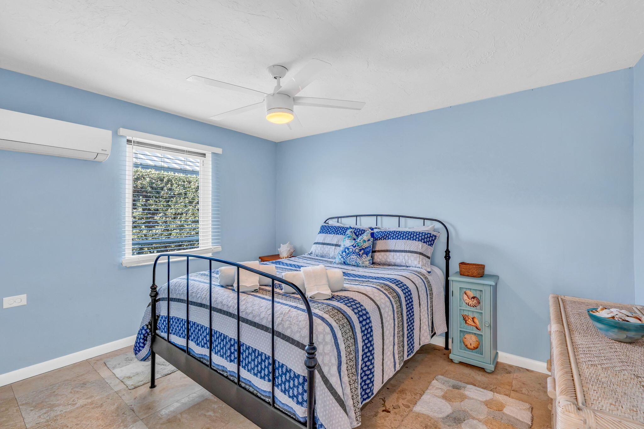 600 12th Street Key Colony Beach, FL 33051 - Photo 24 of 40 a bedroom with a bed and a window
