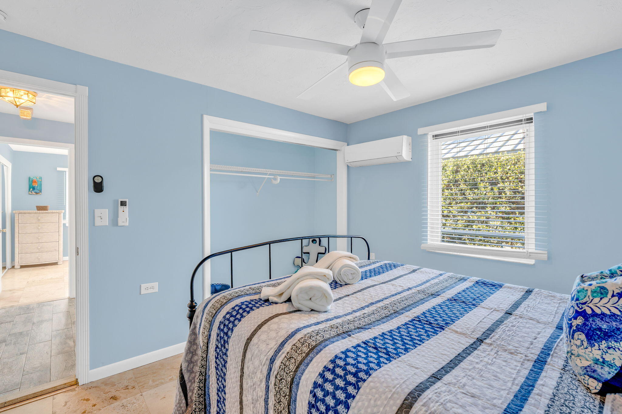 600 12th Street Key Colony Beach, FL 33051 - Photo 25 of 40 a bedroom with a bed and a window