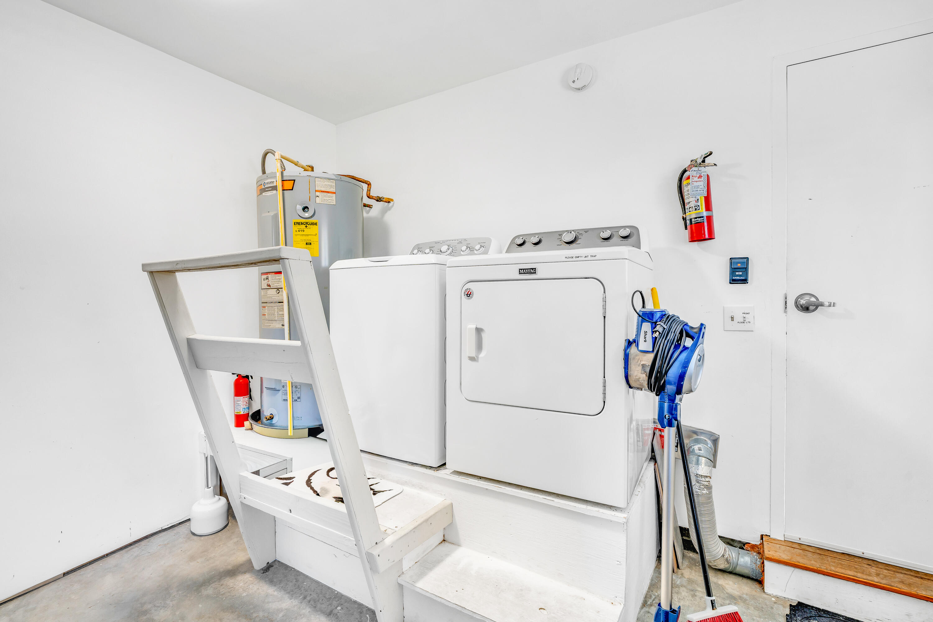 600 12th Street Key Colony Beach, FL 33051 - Photo 32 of 40 a utility room with dryer and washer