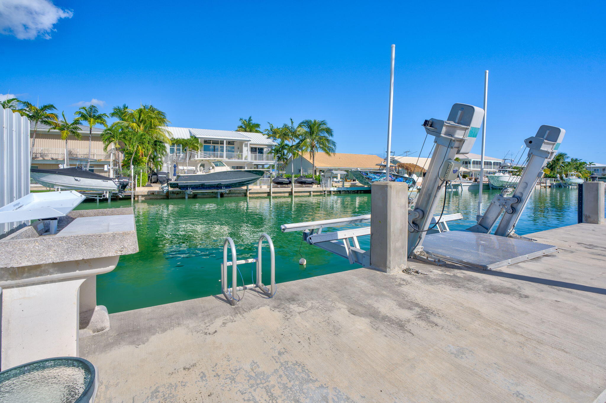 600 12th Street Key Colony Beach, FL 33051 - Photo 33 of 40 a view of a house with a yard and a fountain