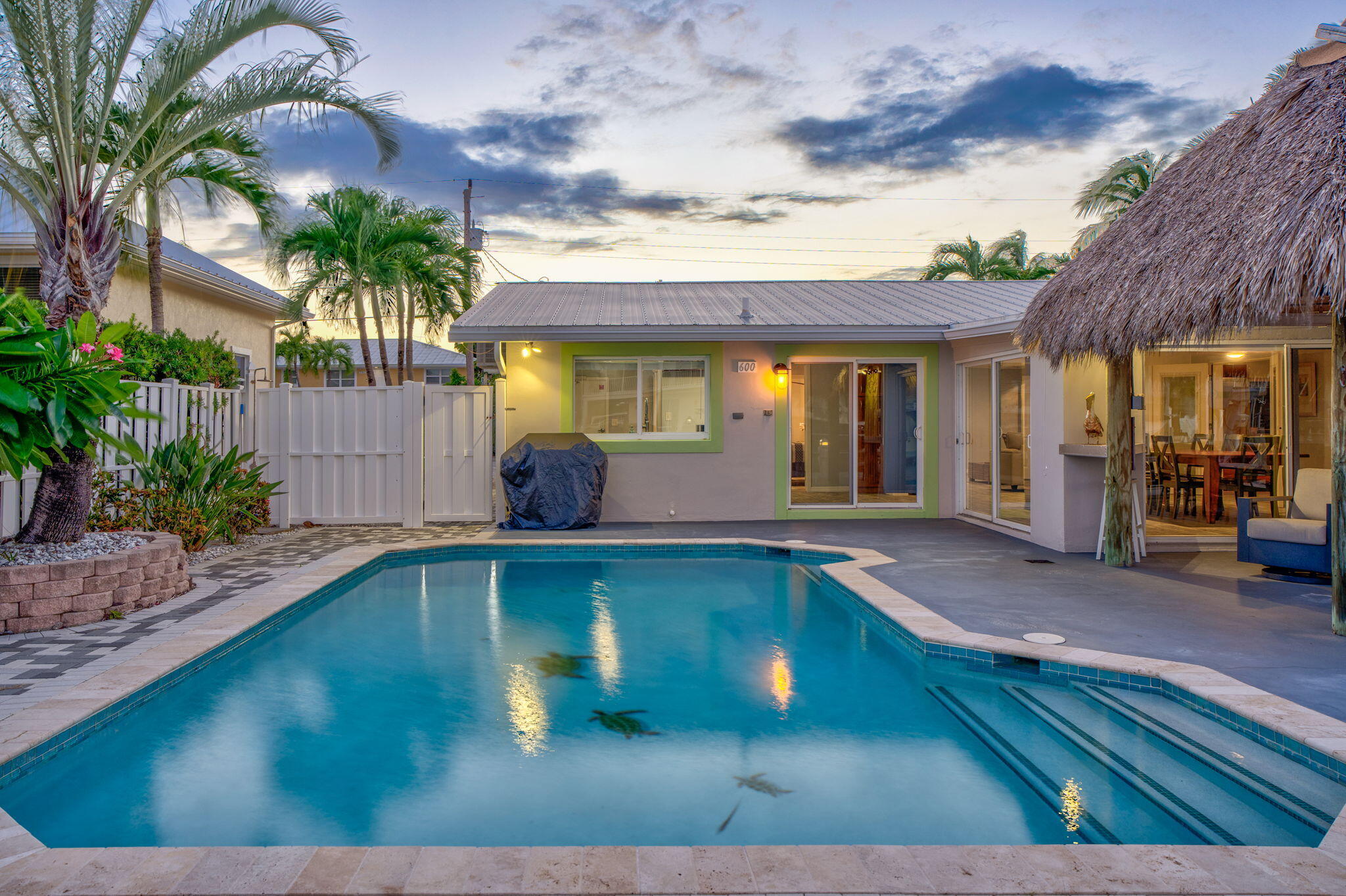 600 12th Street Key Colony Beach, FL 33051 - Photo 37 of 40 a view of a backyard with swimming pool