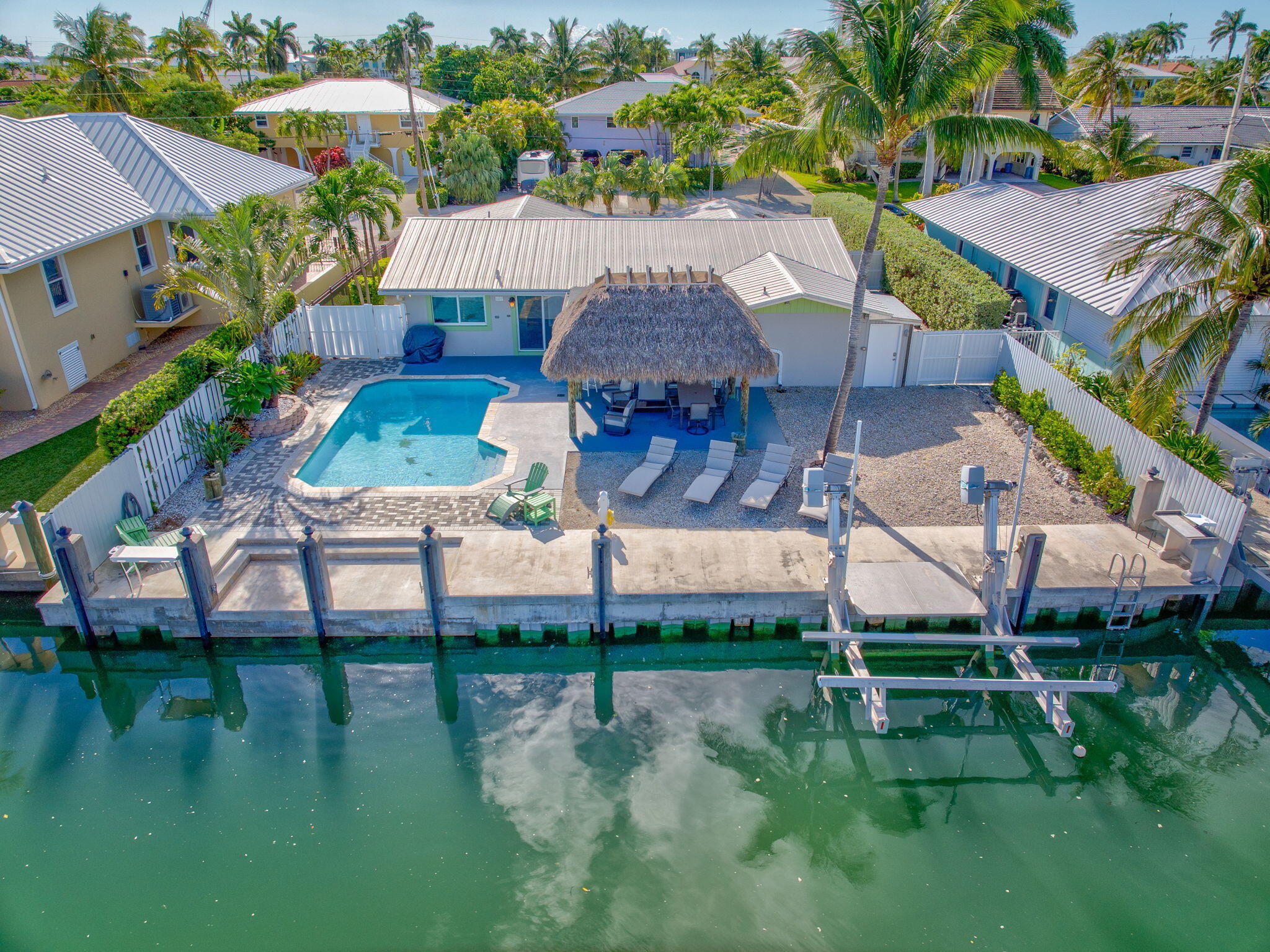 600 12th Street Key Colony Beach, FL 33051 - Photo 4 of 40 an aerial view of a house with garden space and lake view