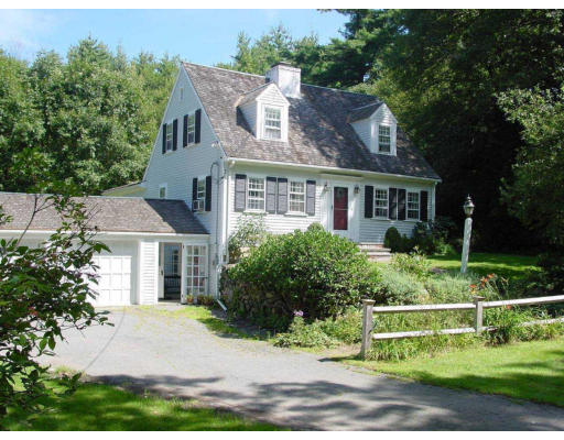 33 Sudbury Road Weston, MA 02493 - Photo 1 of 1 front view of house with a yard