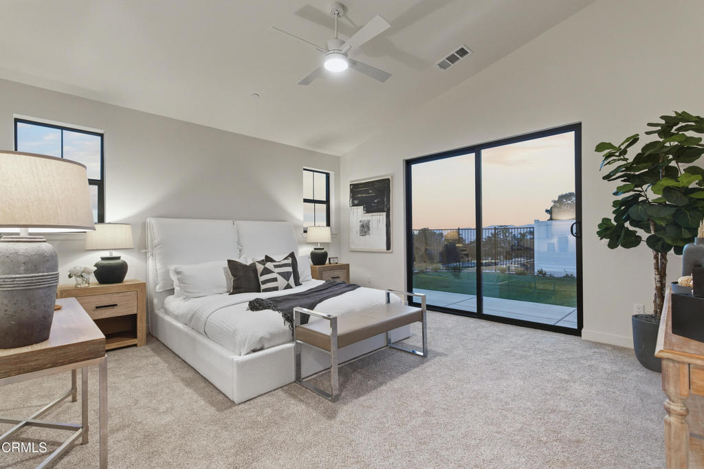 3245 Arrowhead Court Altadena, CA 91001 - Photo 15 of 37 a bedroom with a bed and a large window