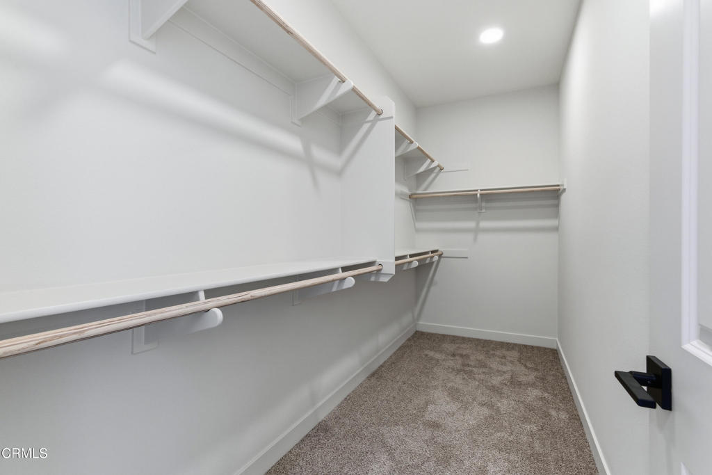 3245 Arrowhead Court Altadena, CA 91001 - Photo 20 of 37 a view of a room with racks on the wall