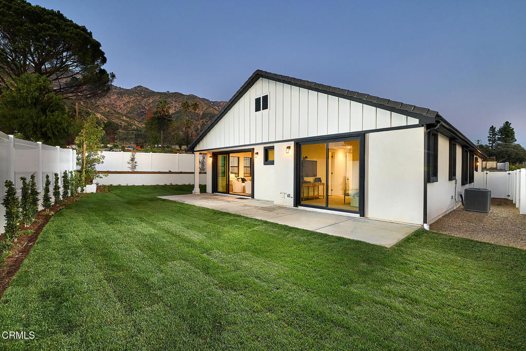 3245 Arrowhead Court Altadena, CA 91001 - Photo 27 of 37 a front view of house with yard and green space