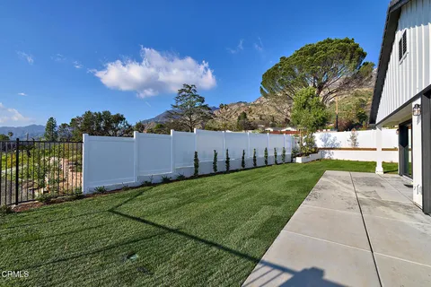 a view of a garden with a slide