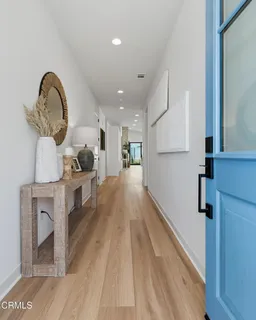 a view of entryway and kitchen