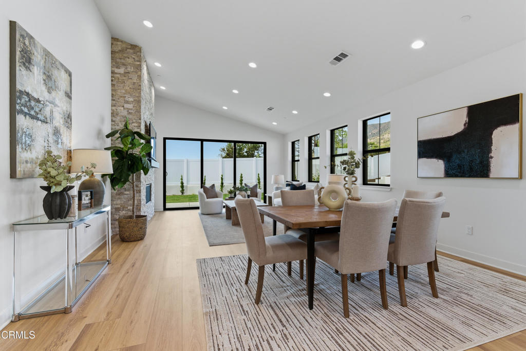 3245 Arrowhead Court Altadena, CA 91001 - Photo 10 of 37 a view of a dining room with furniture window and wooden floor