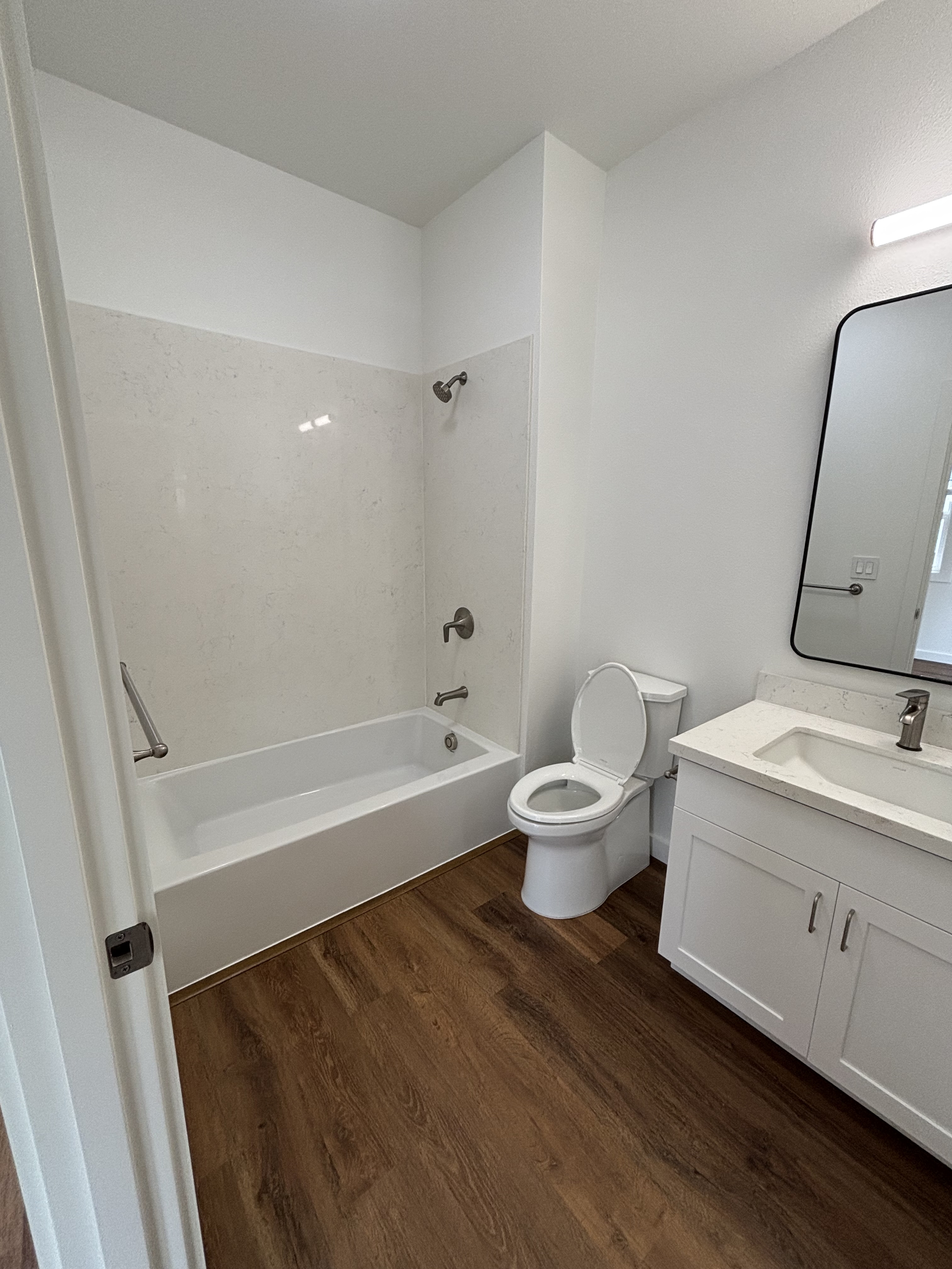 3451 Waikomo Road, Unit D102 Koloa, HI 96756 - Photo 15 of 15 a bathroom with a toilet a sink and bathtub