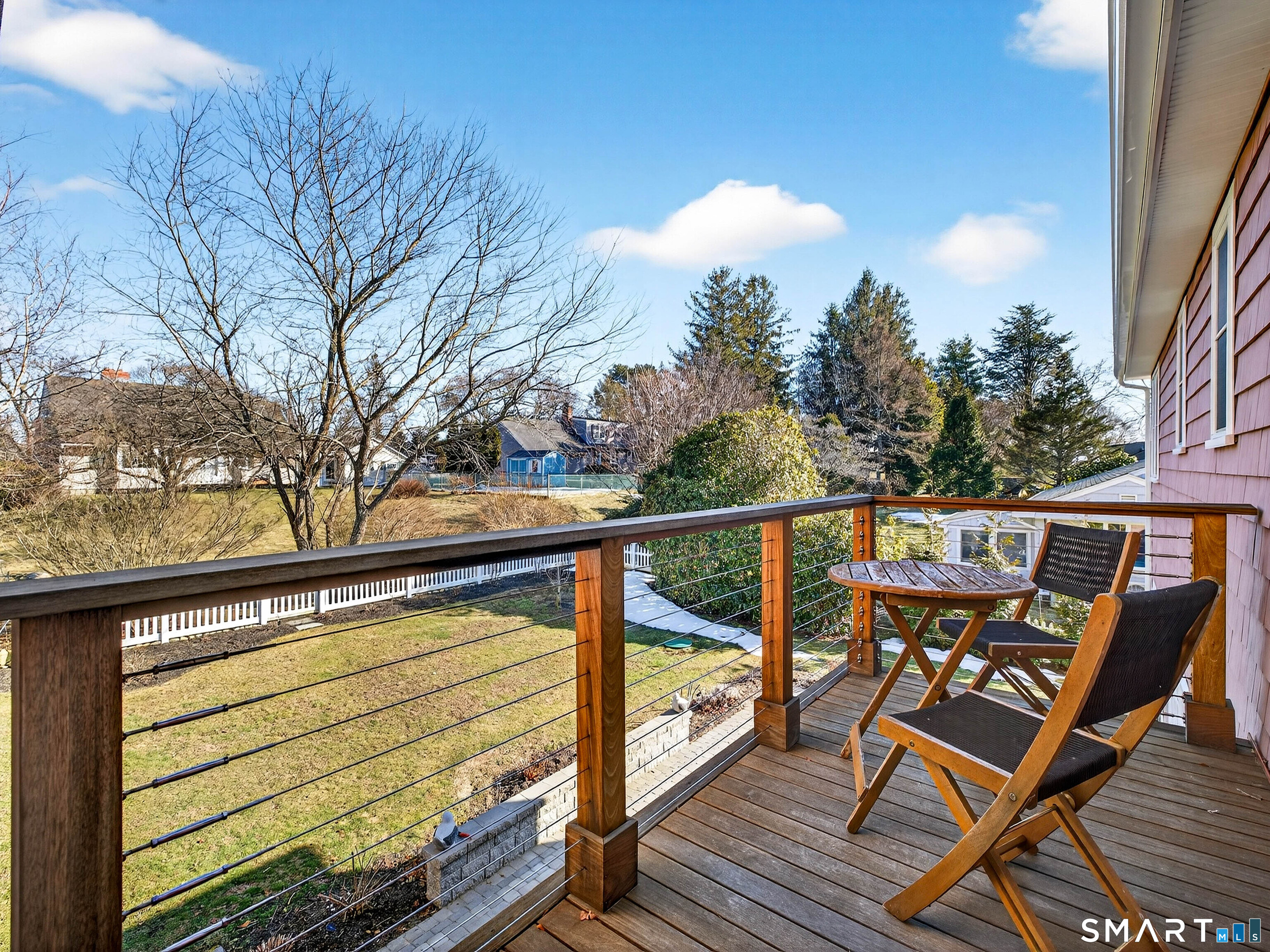 77 Masons Island Road Stonington, CT 06355 - Photo 20 of 35 a view of a two chairs in the balcony